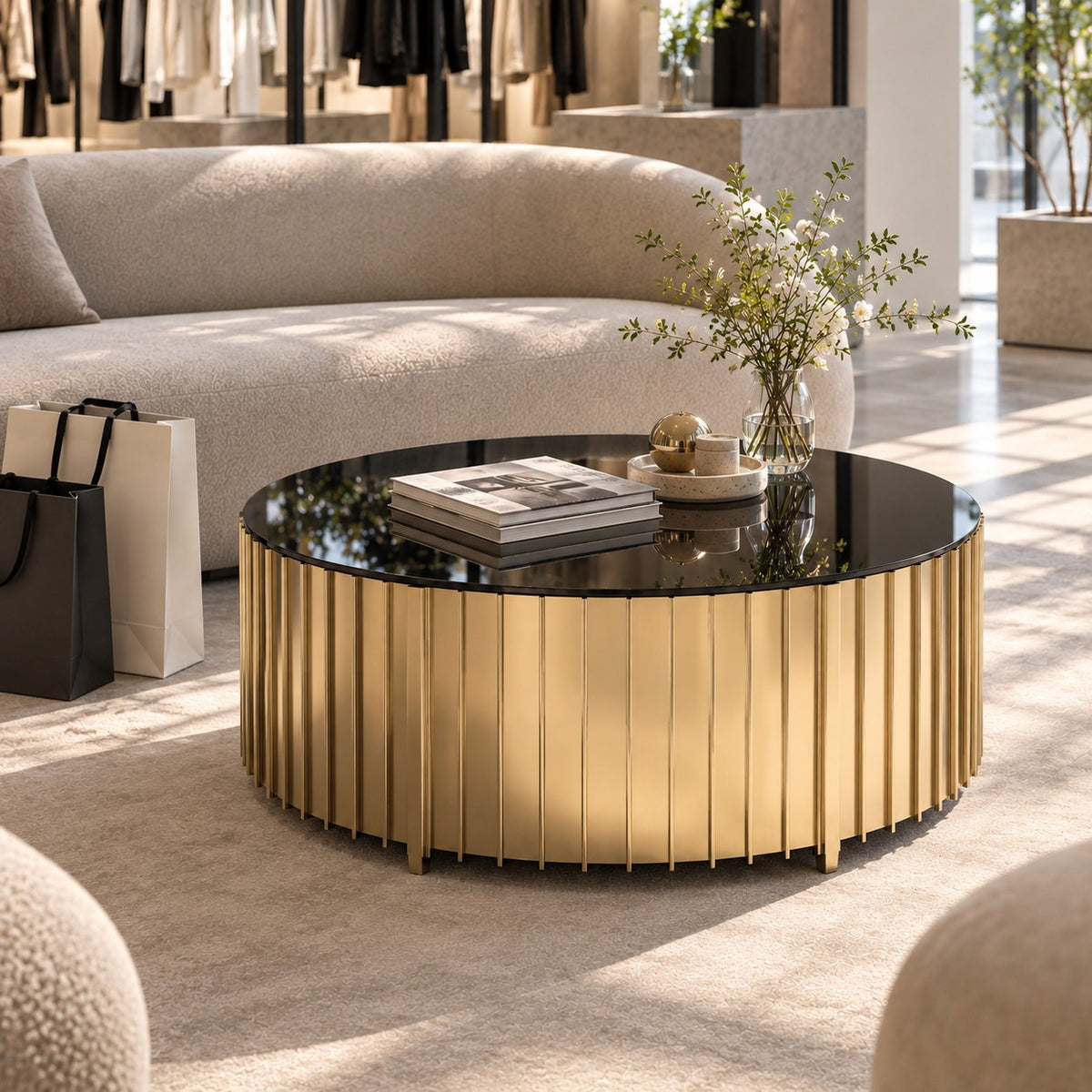 Gold Fluted Drum Coffee Table 使用イメージ（アパレル店）