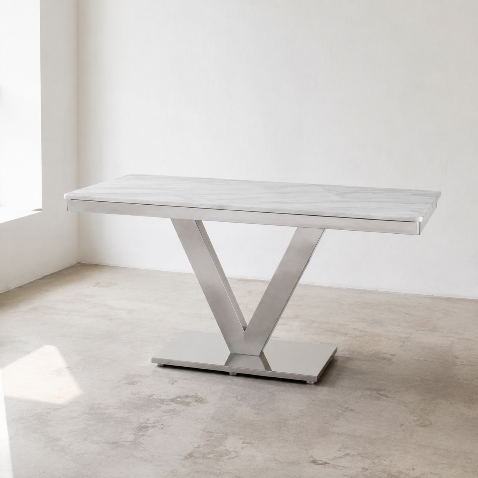 Wing Marble Dining Table in a minimal showroom